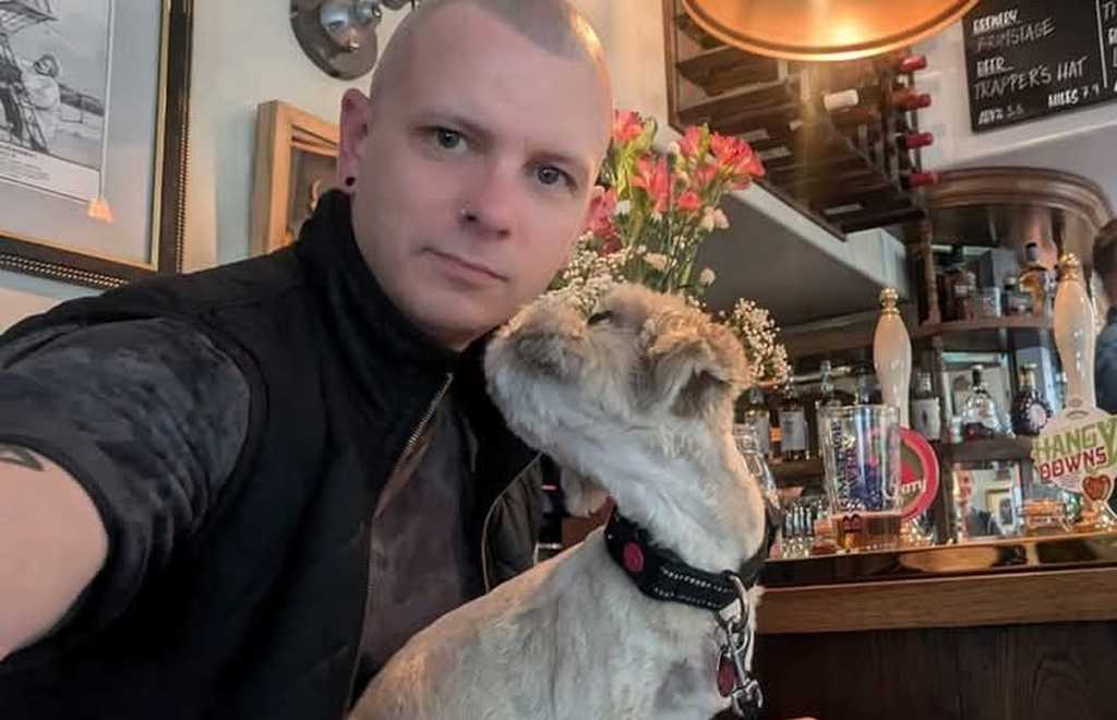 Photo of Tom and his dog