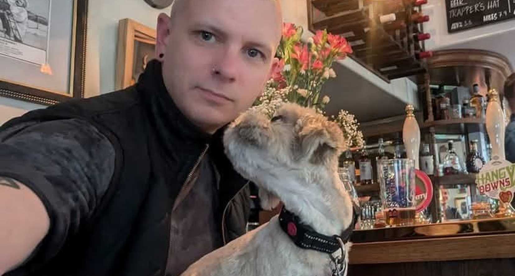 Photo of Tom and his dog
