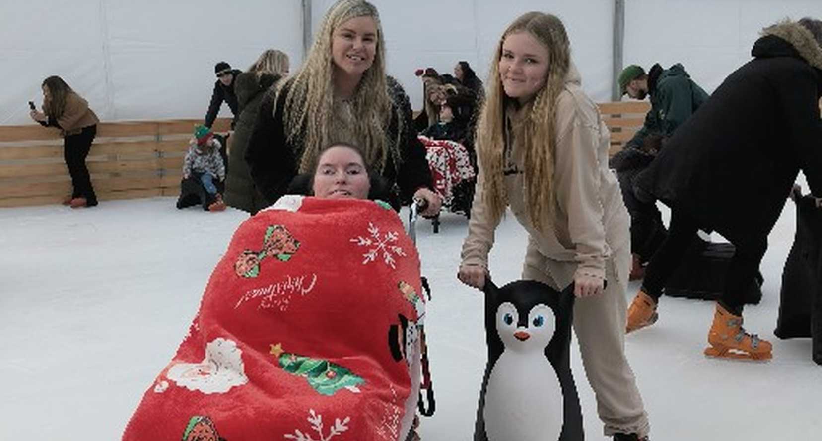 Claire House family on an Ice Skating rink