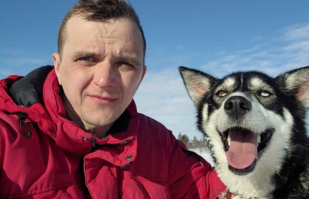 Image of Daniel Ebbrell with husky