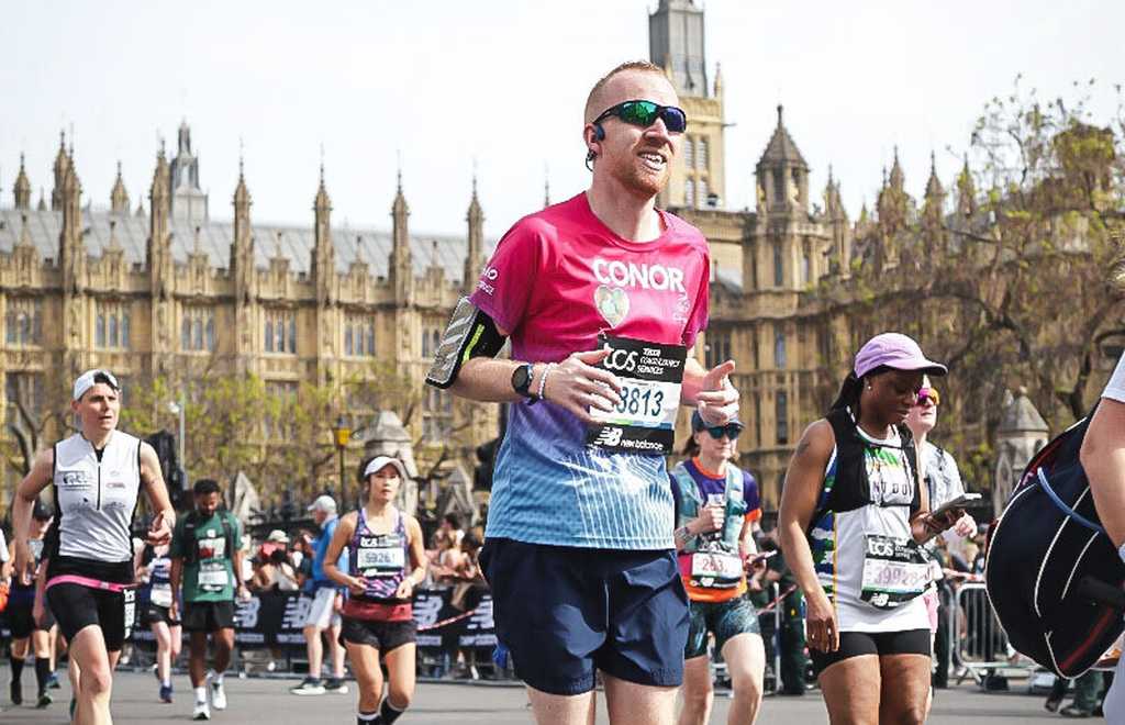 London marathon runner in a Claire House running top