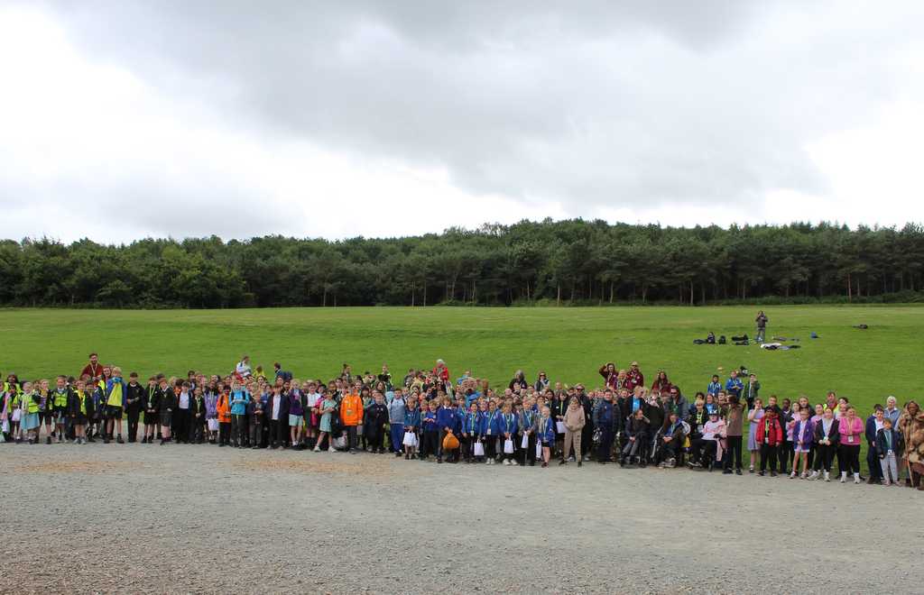 Group of children and staff hiking at delamere forest